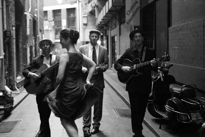 The Irwell Street String Band with Hetty Kate, Sam Lemann, Andy Baylor and Leigh Barker playing in a Melbourne laneway
